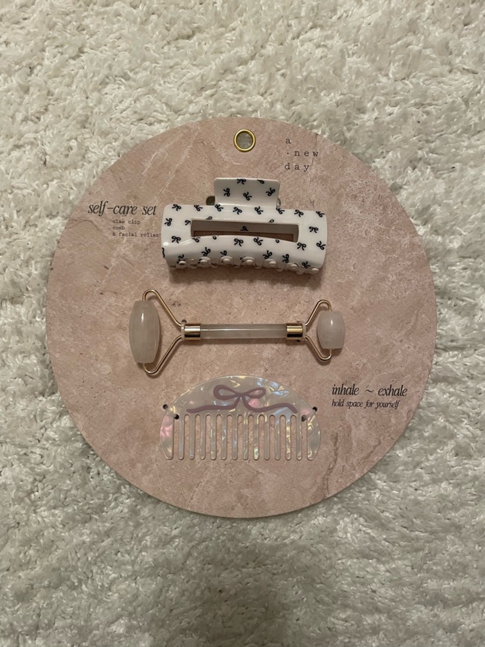 A new day Self-Care Set includes claw clip, facial roller, and comb NWT